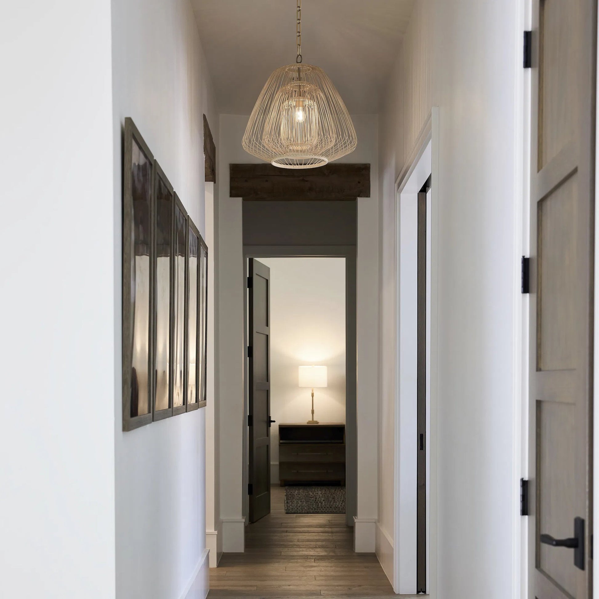 Terrae Triangular Pendant by Cyan Design in aged brass. Made from rattan, metal in a rustic style.