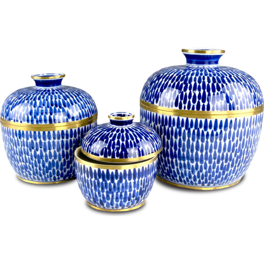 Plavan Jar Set by Currey and Company in blue, white, brass. Made from ceramic, brass in a traditional style.