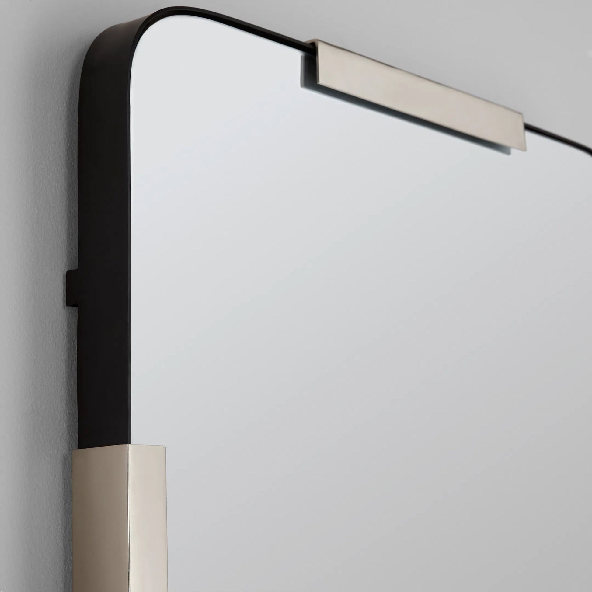 Speculo Mirror by Cyan Design. Made from iron, cast aluminum, mirrored glass in a transitional style.