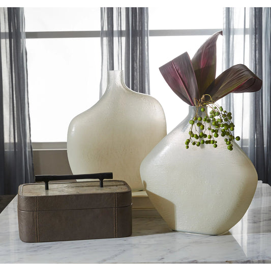 Taku Round Vase by Cyan Design in icy teal. Made from glass in a unique style.