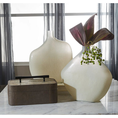 Taku Round Vase by Cyan Design in icy teal. Made from glass in a transitional style.