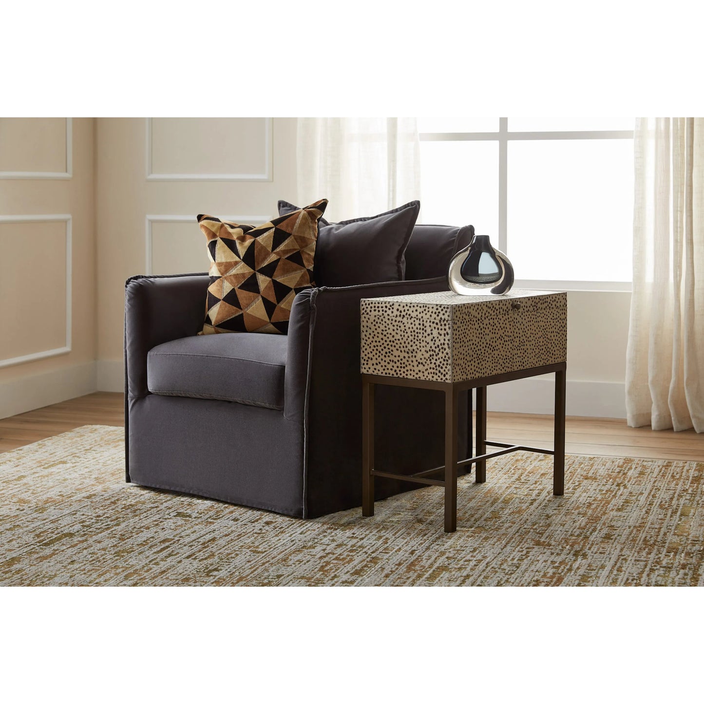 004 SI-2328607 | Lifestyle | Gaborone Box on Stand by Cyan Design in antique brass. Made from hide leather, mild steel in a eclectic & global style.