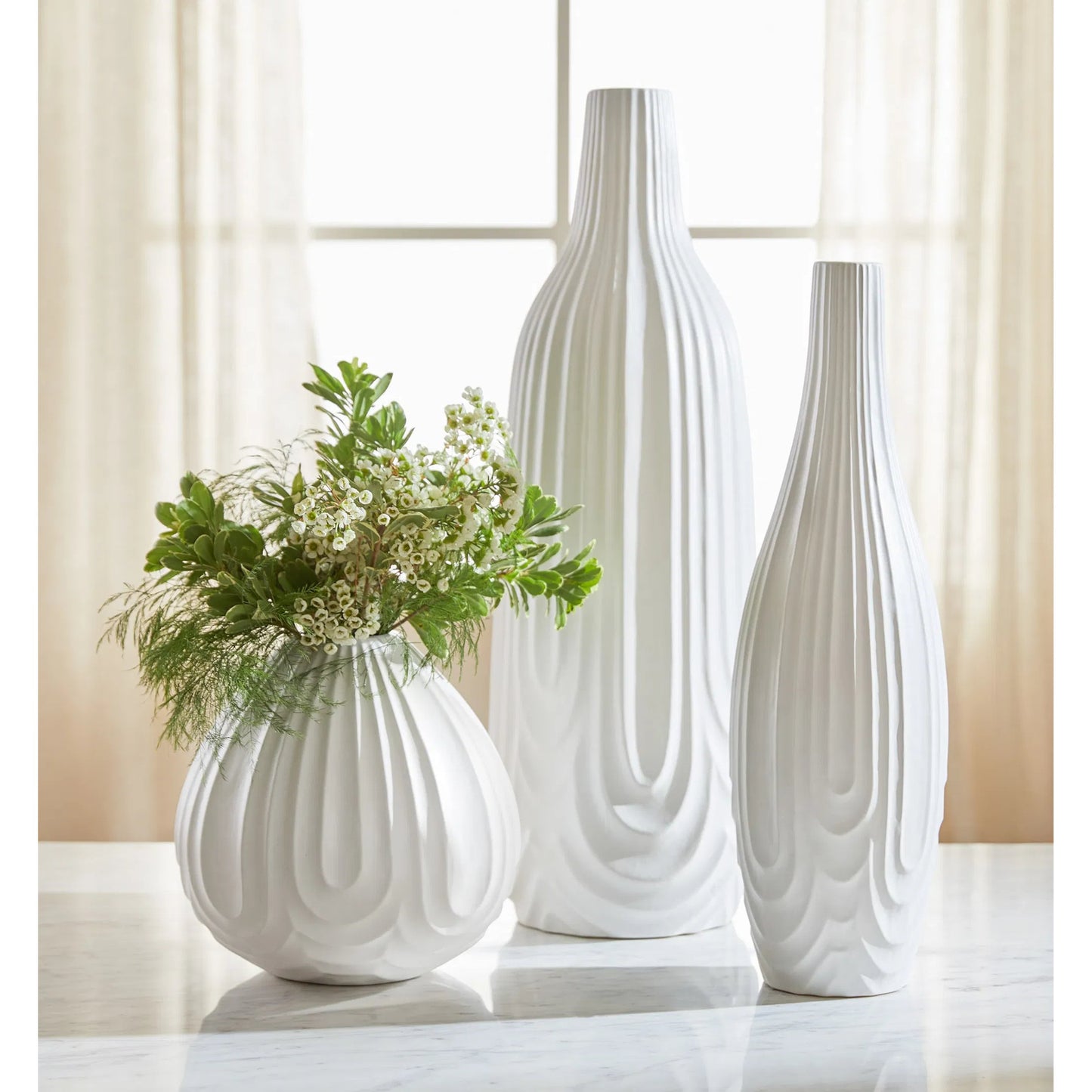 012 SI-2328697 | Lifestyle | Nigel Vase by Cyan Design in white. Made from ceramic in a modern style.