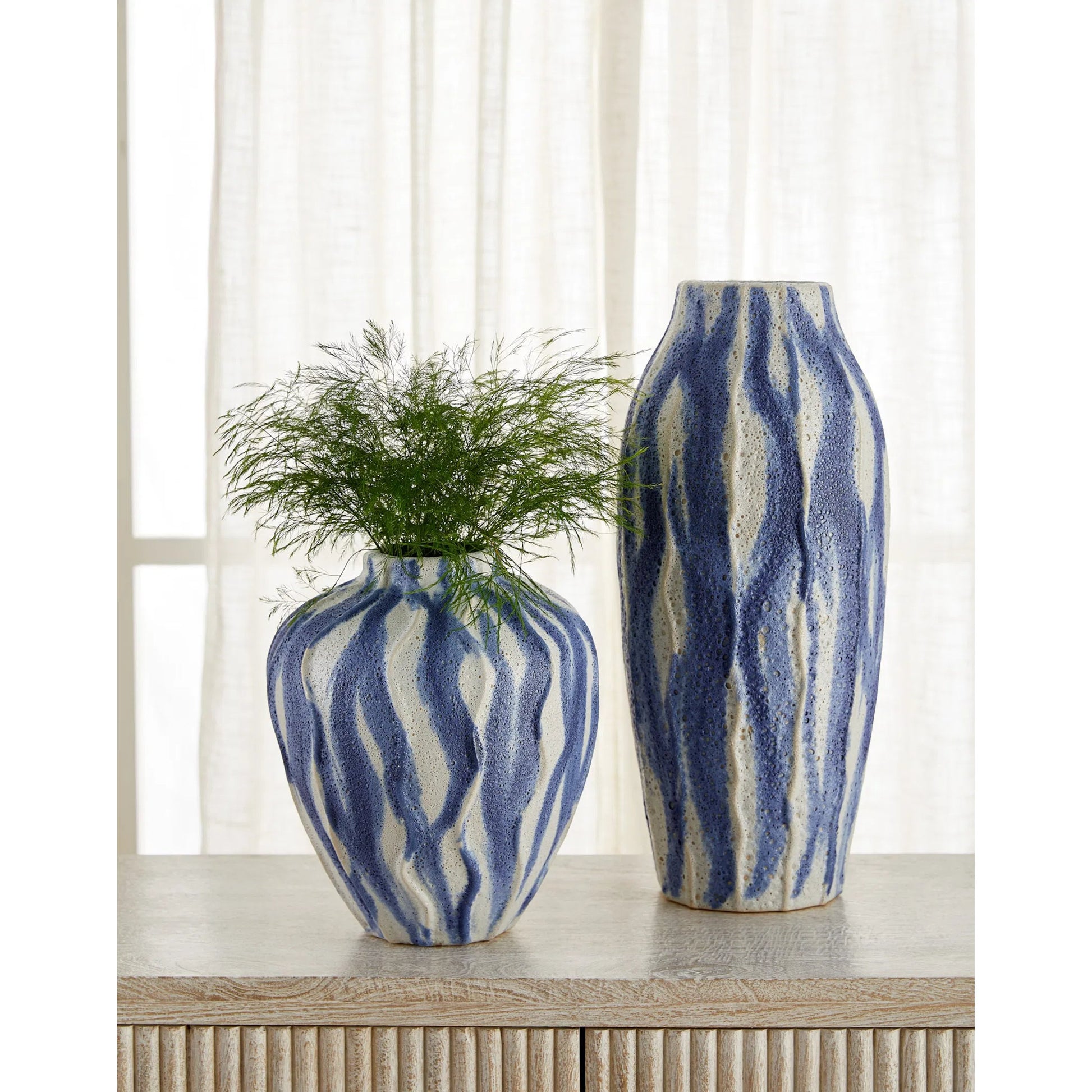 Ripple Vase by Cyan Design in chalk white, blue. Made from ceramic in a eclectic & global style.