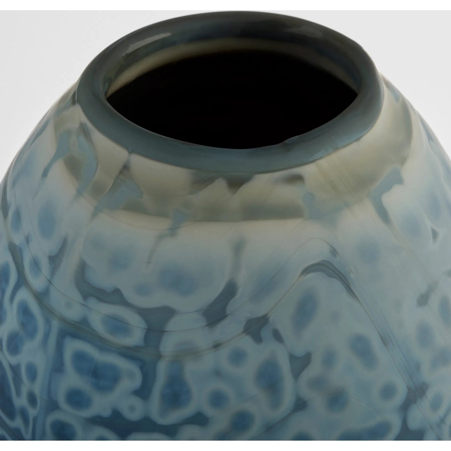 006 SI-2445047 | Closeup | Tiedye Vase by Cyan Design in milky matte blue. Made from cased glass in a eclectic & global style.