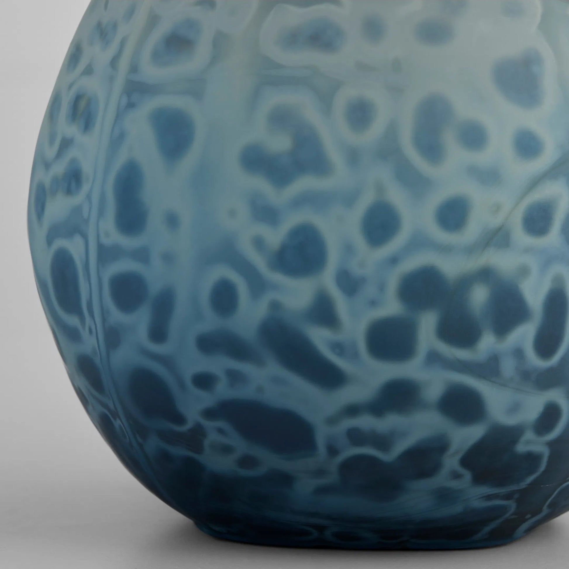 Tiedye Vase by Cyan Design in milky matte blue. Made from cased glass in a eclectic & global style.