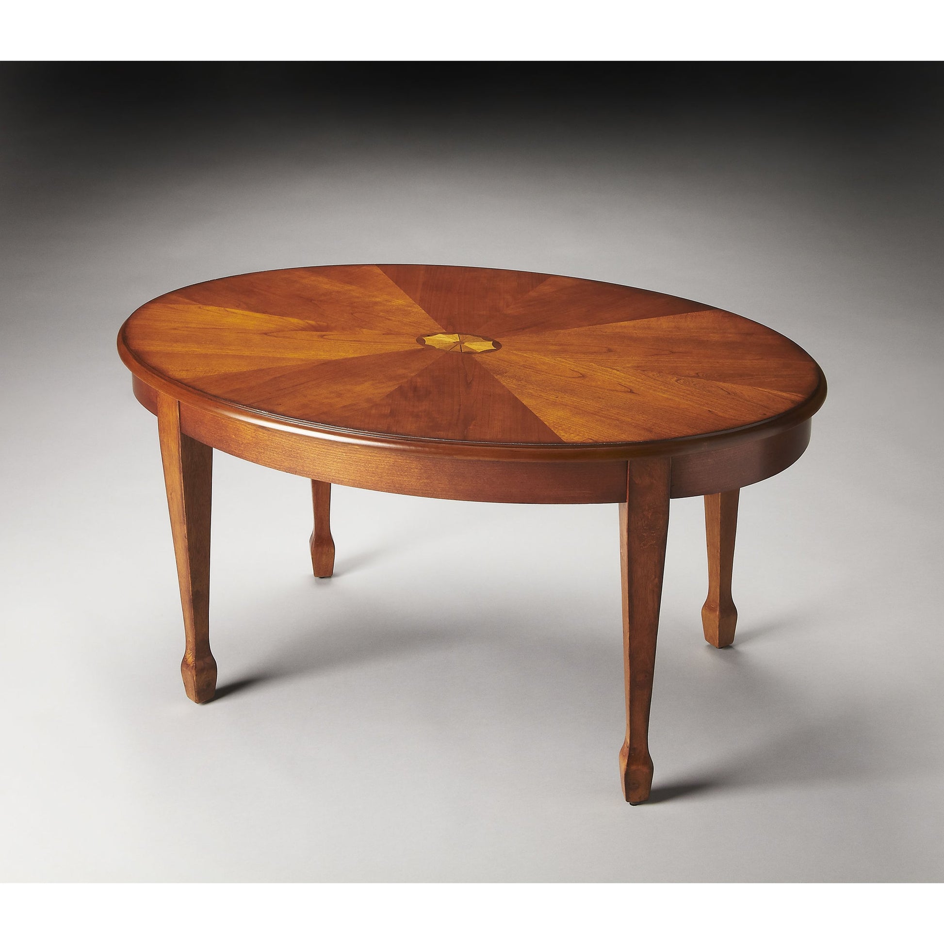 Clayton Cherry Cocktail Table by Butler Specialty Company. Made from poplar solids, mdf, cherry, maple, walnut veneers in a traditional style.