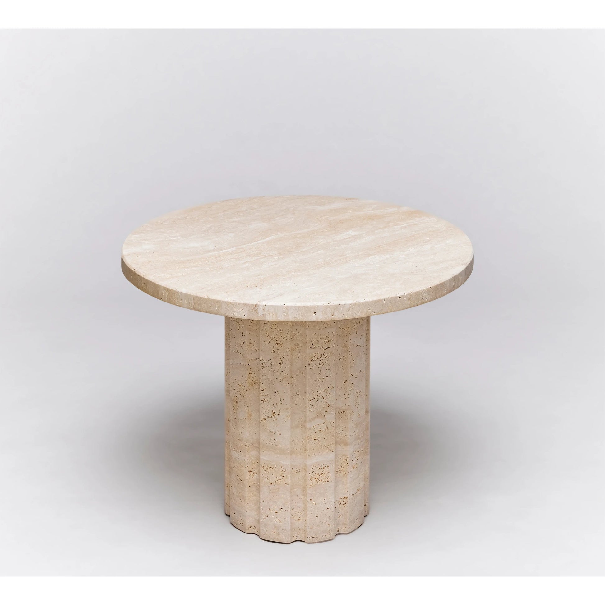 Amerigo Side Table by Interlude Home in raw travertine. Made from travertine in a modern style.