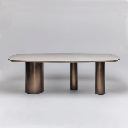 Becket Dining Table by Interlude Home in cliffside grey, classic bronze. Made from oak, steel in a modern style.