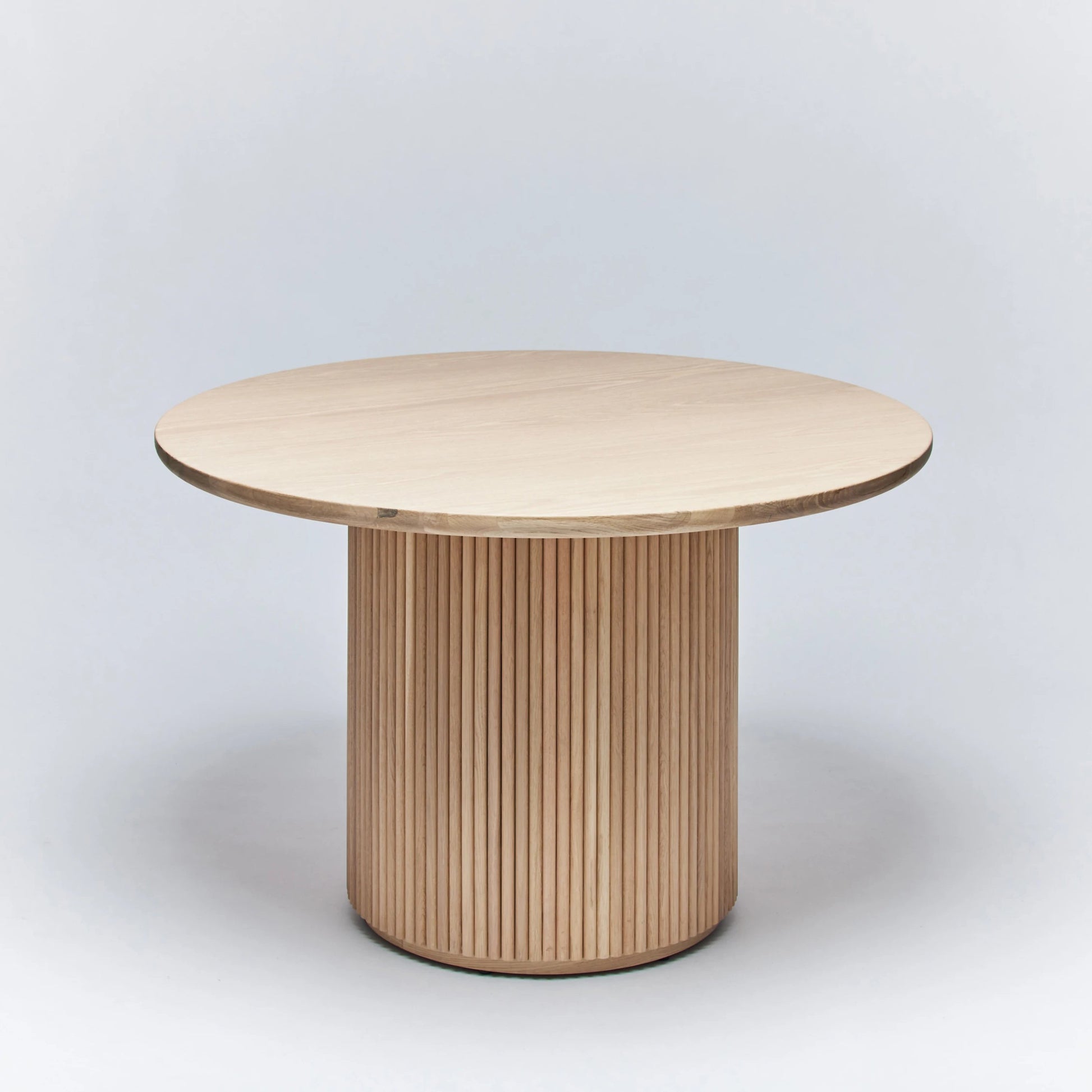 Laurel Round Dining Table by Interlude Home. Made from oak in a modern style.