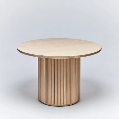 Laurel Round Dining Table by Interlude Home. Made from oak in a modern style.