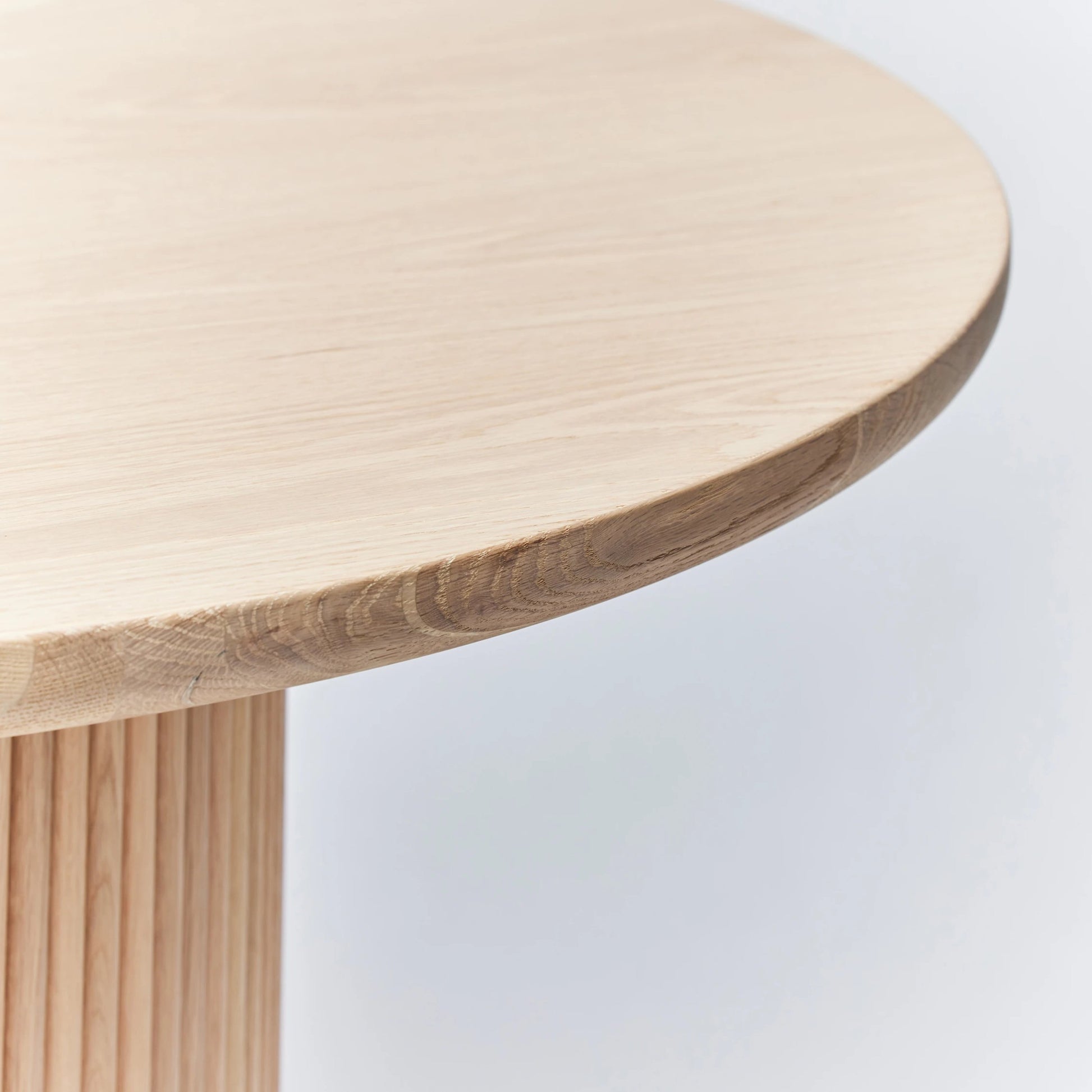 Laurel Round Dining Table by Interlude Home. Made from oak in a modern style.