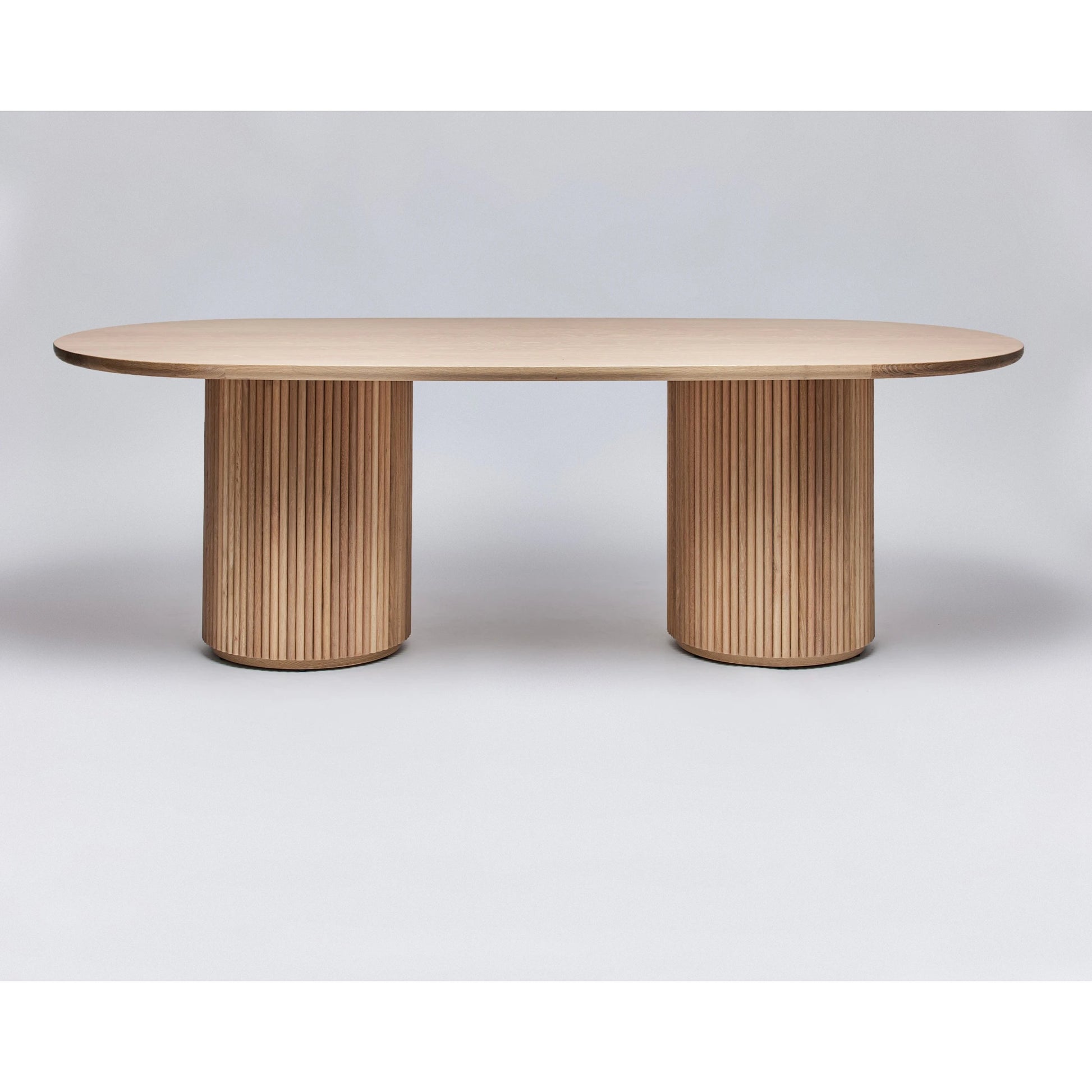 Laurel Oval Dining Table by Interlude Home. Made from oak in a modern style.