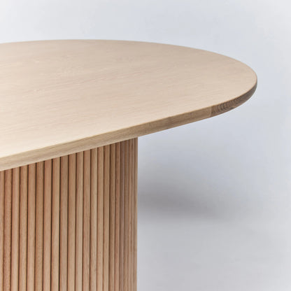 Laurel Oval Dining Table by Interlude Home. Made from oak in a modern style.