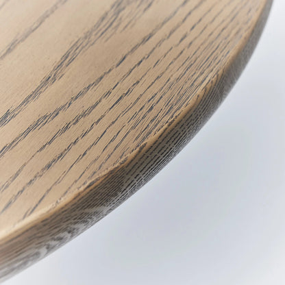 Laurel Round Dining Table by Interlude Home. Made from oak in a modern style.