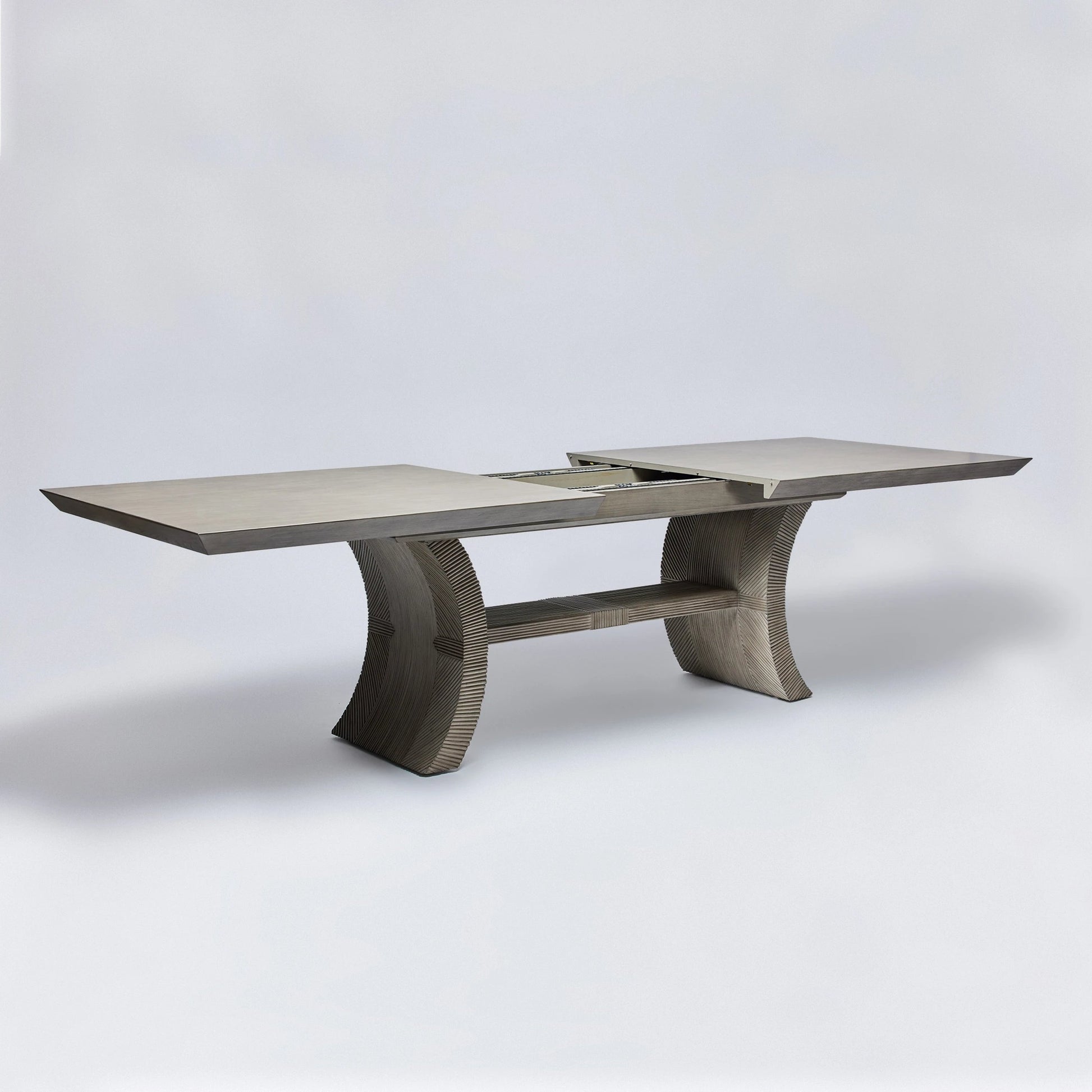 Deerfield Extension Table by Interlude Home in washed grey. Made from sungkai wood in a modern style.