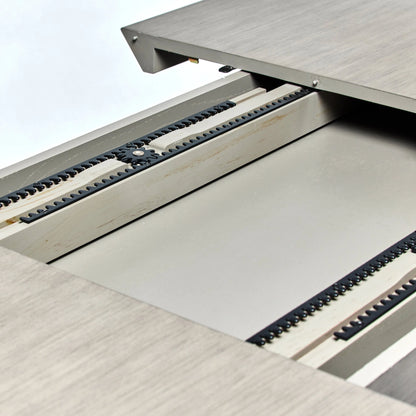 Deerfield Extension Table by Interlude Home in washed grey. Made from sungkai wood in a modern style.