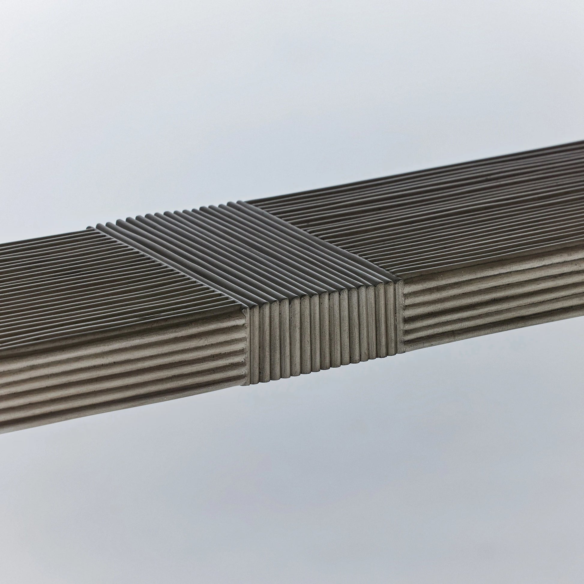 Deerfield Extension Table by Interlude Home in washed grey. Made from sungkai wood in a modern style.