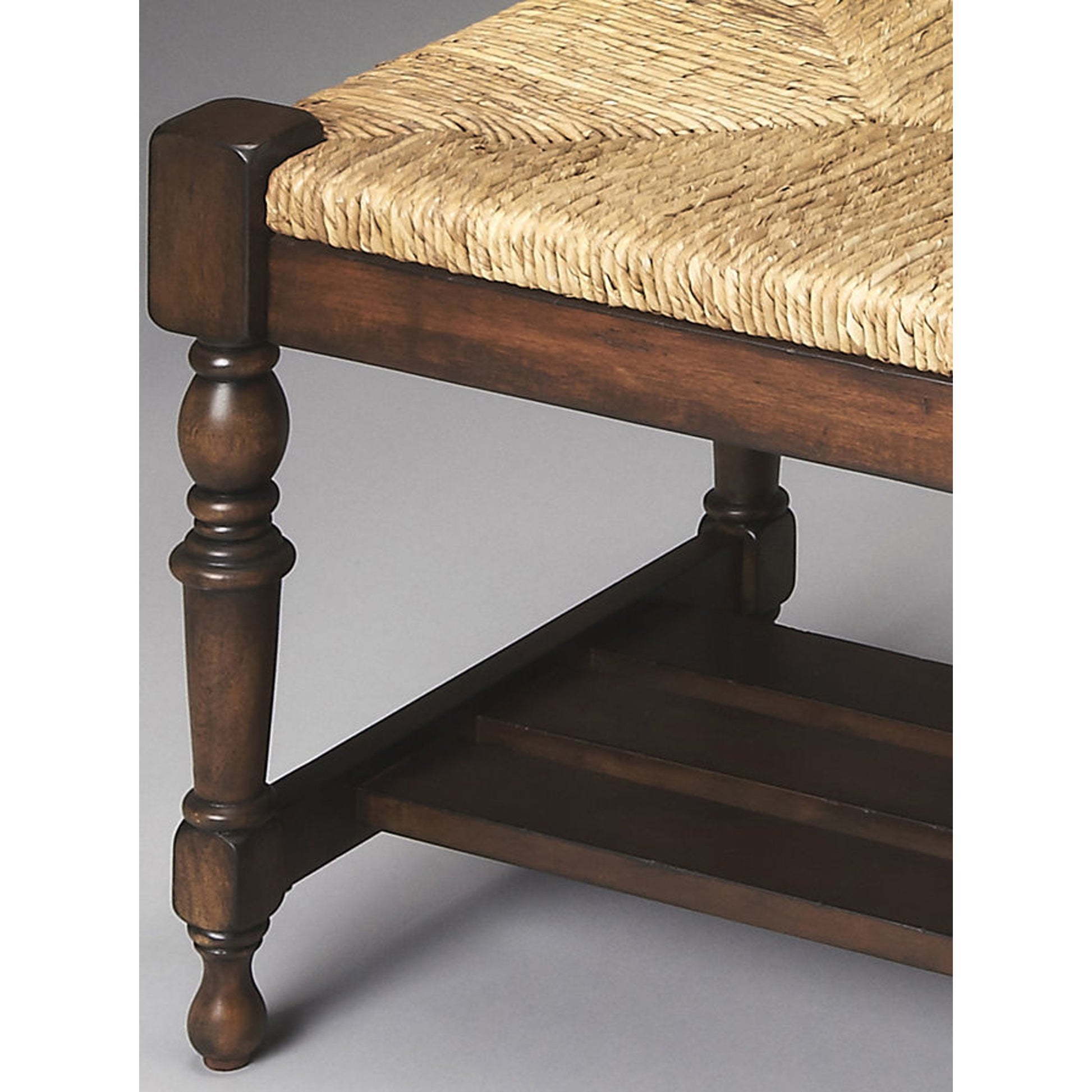 Bench by Butler Specialty Company in multi-color and heritage. Made from gemelina wood, lampakany rope in a traditional style.