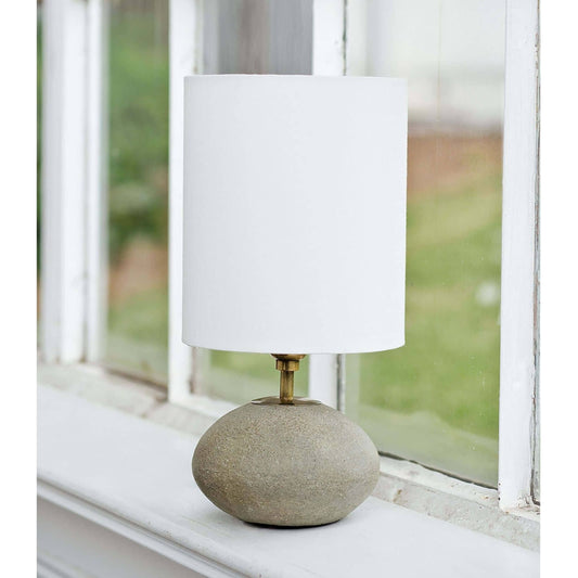 Concrete Mini Orb Lamp by Regina Andrew in gray. Made from concrete in a modern style.