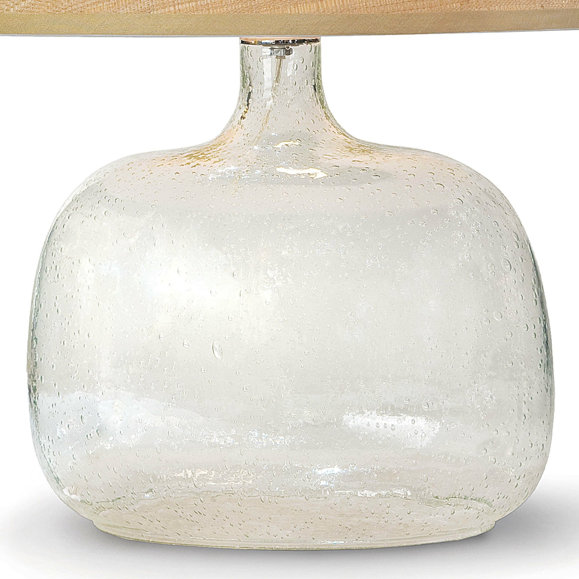 Seeded Oval Glass Table Lamp by Regina Andrew in clear and clear. Made from glass in a coastal style.