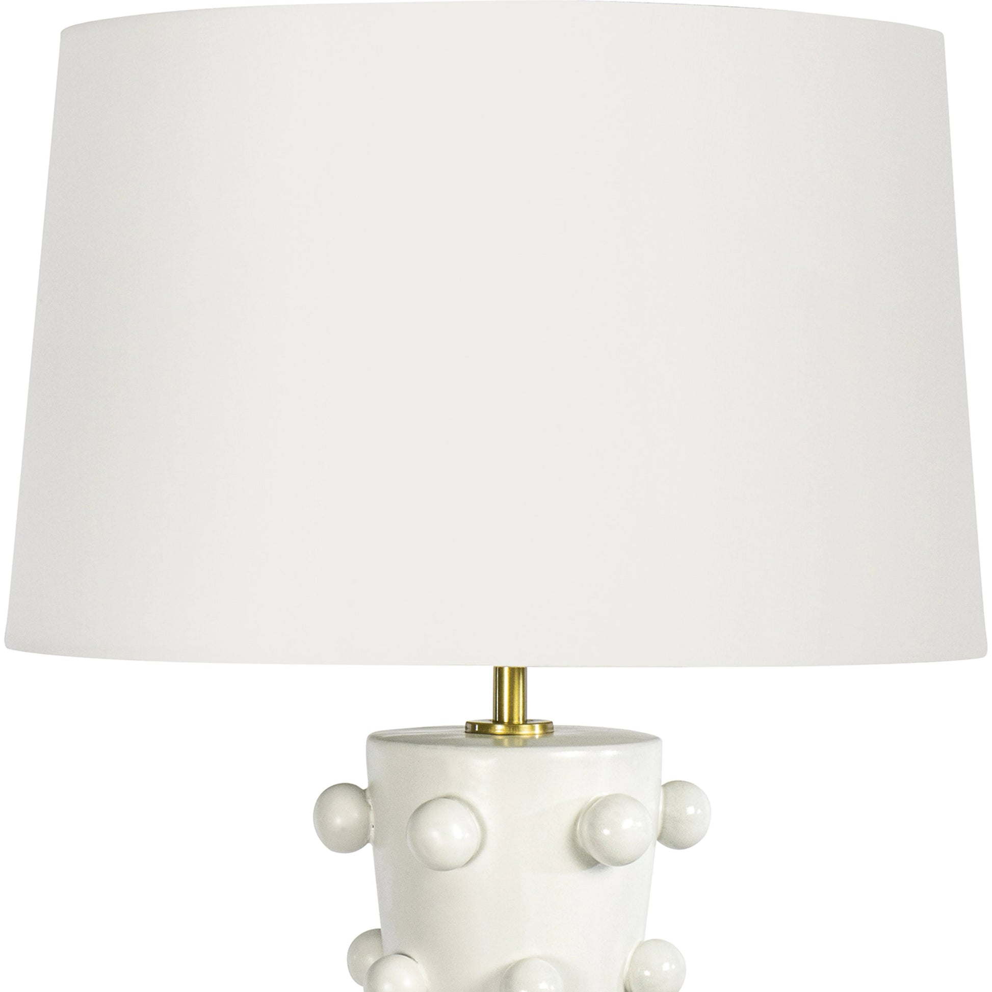 Pom Pom Table Lamp by Regina Andrew in white. Made from ceramic in a modern style.