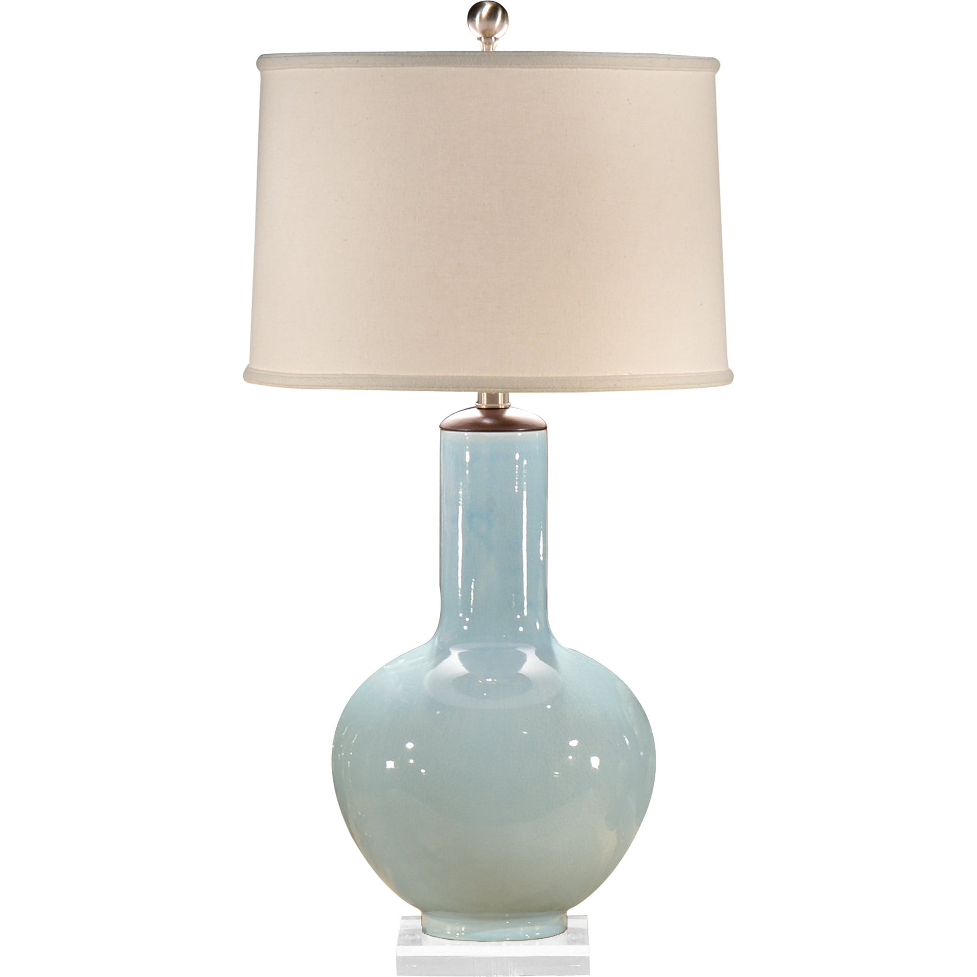 Cayden Lamp by Wildwood in pale blue glaze, wood, clear. Made from ceramic, porcelain in a transitional style.