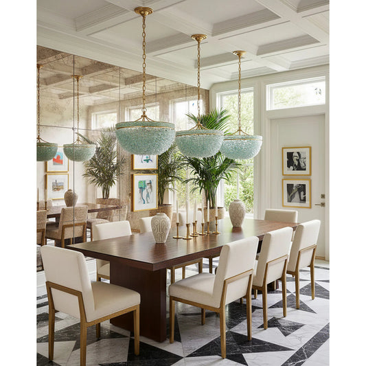 Bayou Chandelier by Currey and Company in contemporary gold leaf, seaglass. Made from wrought iron, glass in a coastal style.