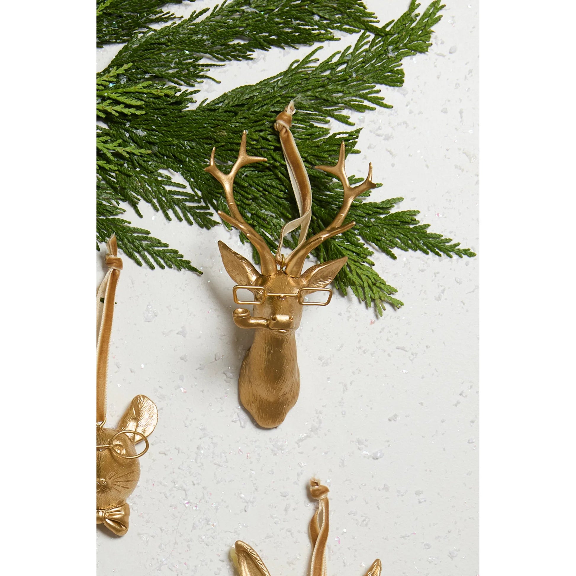 E+E Frankie Ornament 4 (Set of 4) by Accent Decor in gold. Made from resin in a unique style.