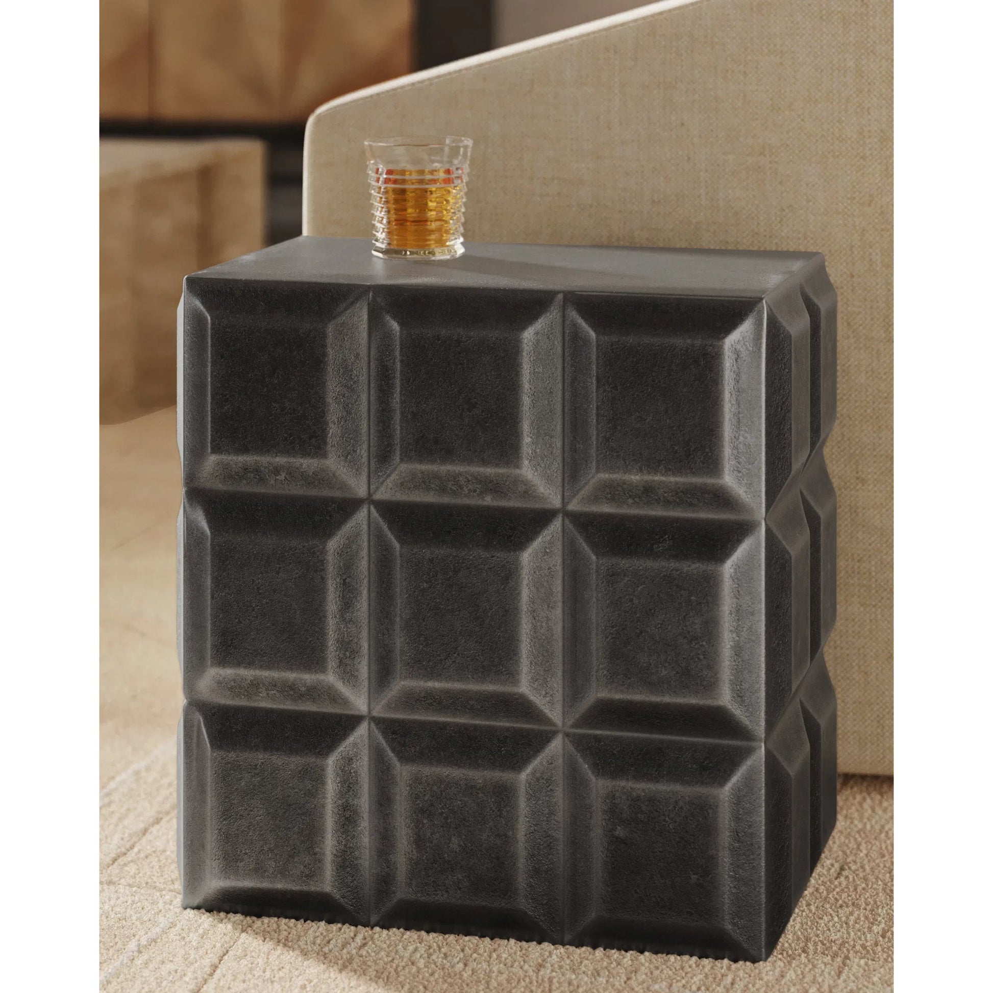 Bower Side Table by Currey and Company in black nickel. Made from cast aluminum in a modern style.