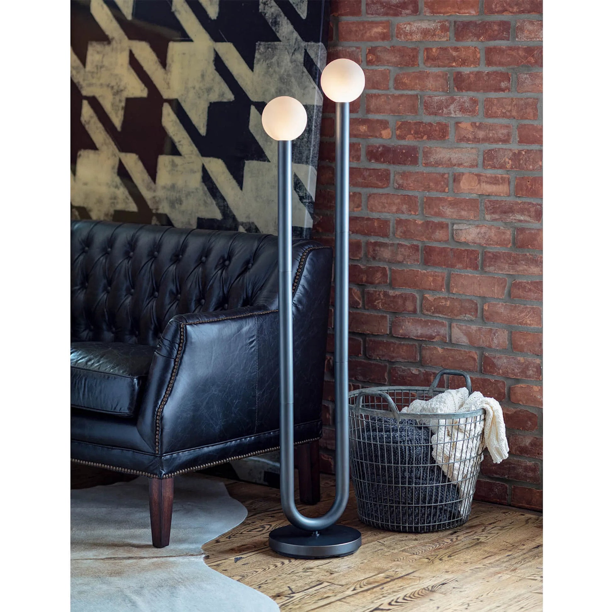 Happy Floor Lamp by Regina Andrew. Made from steel in a modern style.
