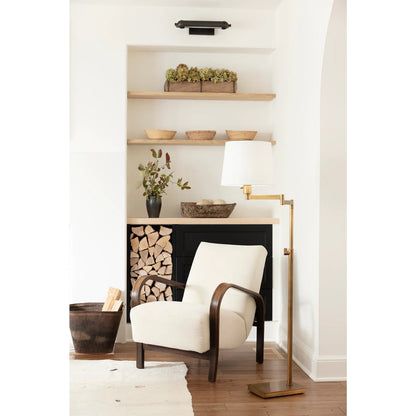 Virtue Floor Lamp by Regina Andrew in brass and natural brass. Made from steel in a modern style.