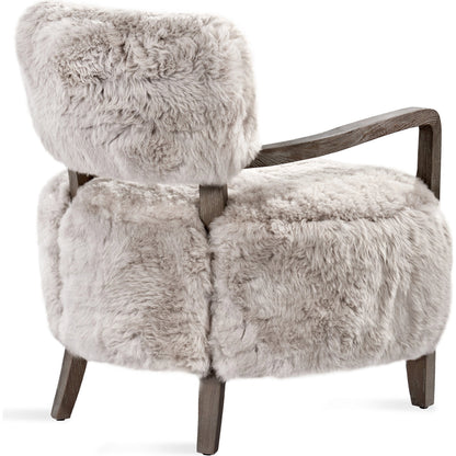 Royce Lounge Chair by Interlude Home in autumn brown, morel taupe. Made from wood, tibetan lamb skin in a rustic style.