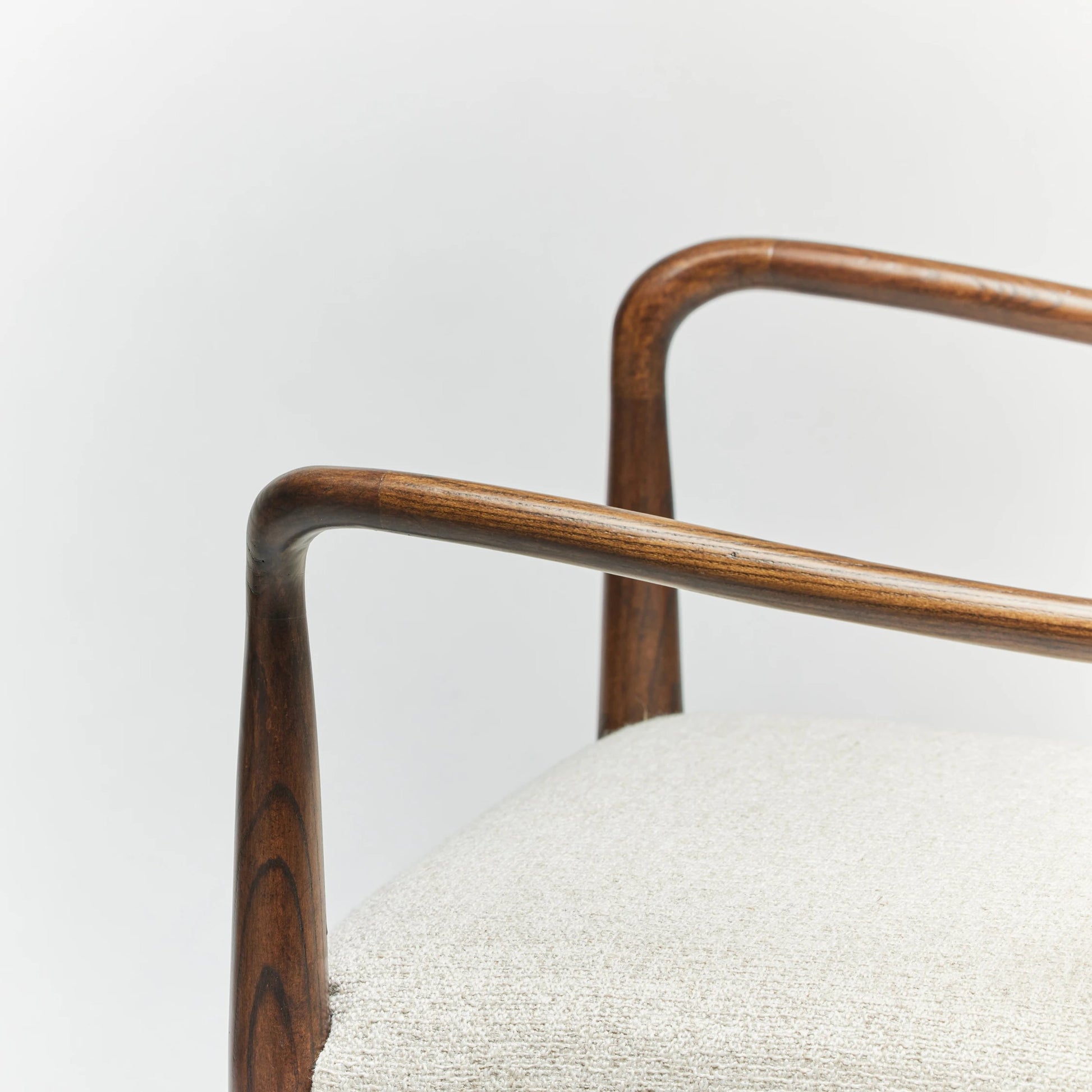 Serafina Arm Chair by Interlude Home in luster, walnut, brushed brass. Made from saxon weave, wood, metal in a modern style.