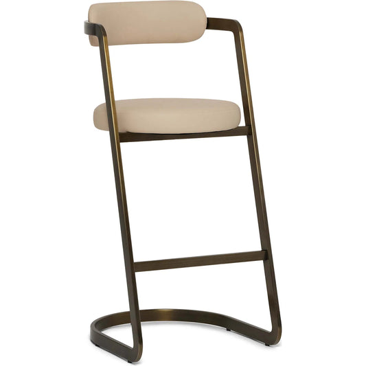 Baldwin Bar Stool by Interlude Home in antique bronze, cream latte. Made from stainless steel, vegan leather in a unique style.