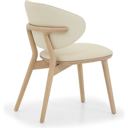 Soren Dining Chair by Interlude Home. Made from oak, vegan leather in a transitional style.