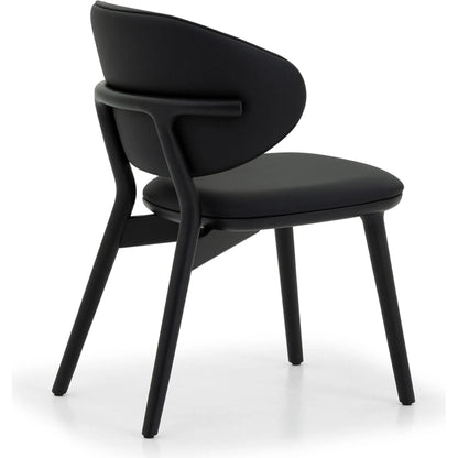 Soren Dining Chair by Interlude Home. Made from oak, vegan leather in a transitional style.