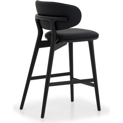 Soren Counter Stool by Interlude Home. Made from oak, vegan leather, metal in a transitional style.
