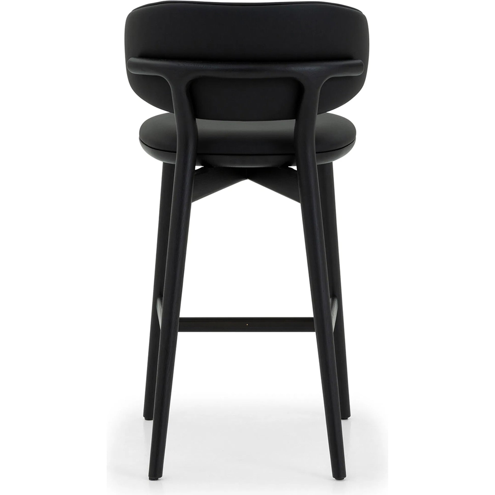Soren Counter Stool by Interlude Home. Made from oak, vegan leather, metal in a transitional style.
