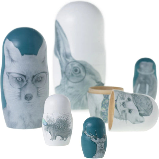 E+E Framiily Nesting Dolls by Accent Decor in turquoise. Made from wood in a modern style.