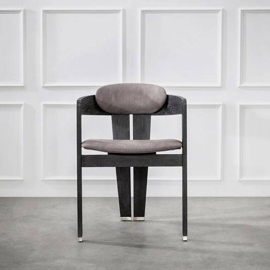 Maryl Dining Chair by Interlude Home. Made from wood, faux leather, metal in a modern style.