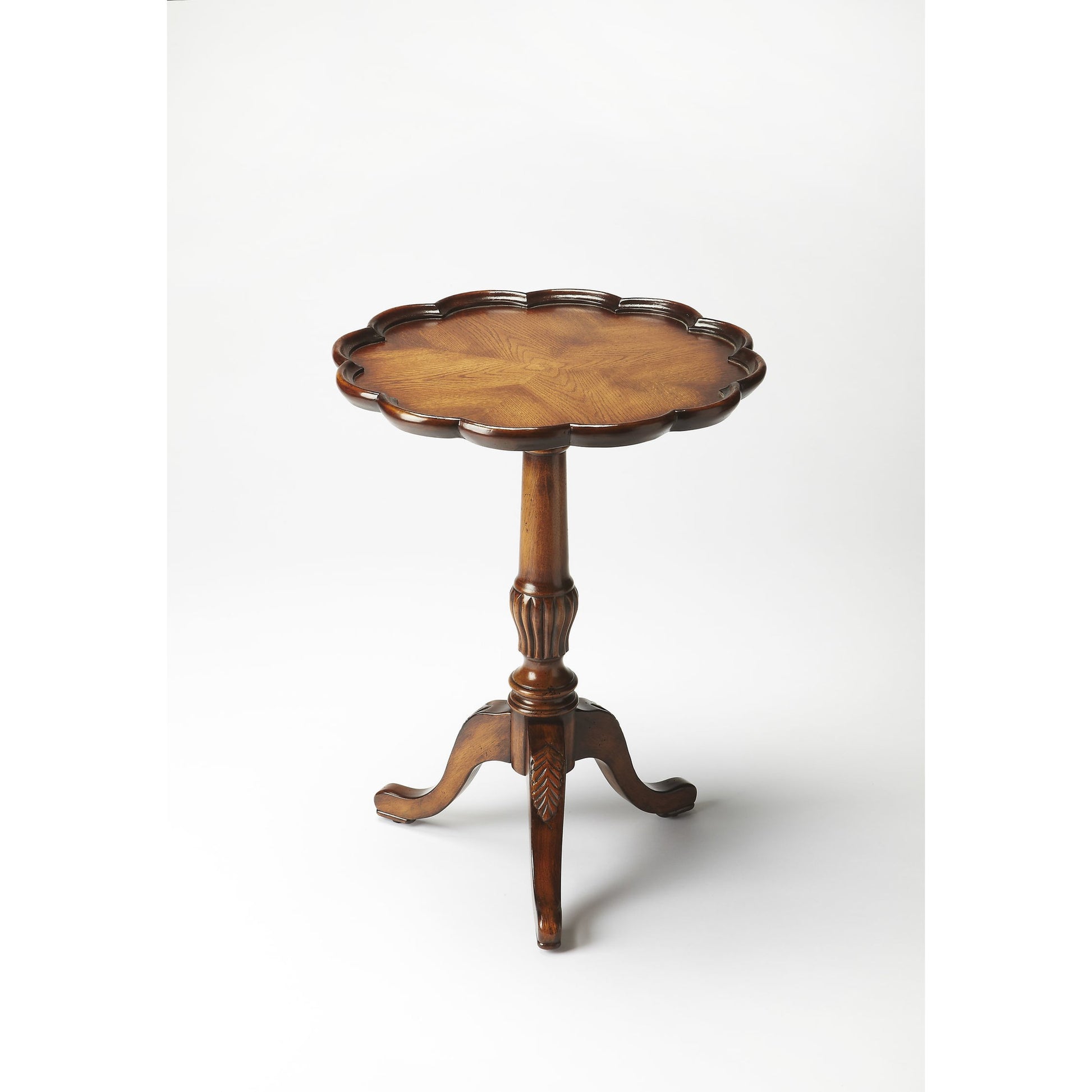 Dansby Pedestal Table by Butler Specialty Company. Made from rubberwood: 50%, oak veneers: 25%, mdf: 20%, resin: 5% in a traditional style.