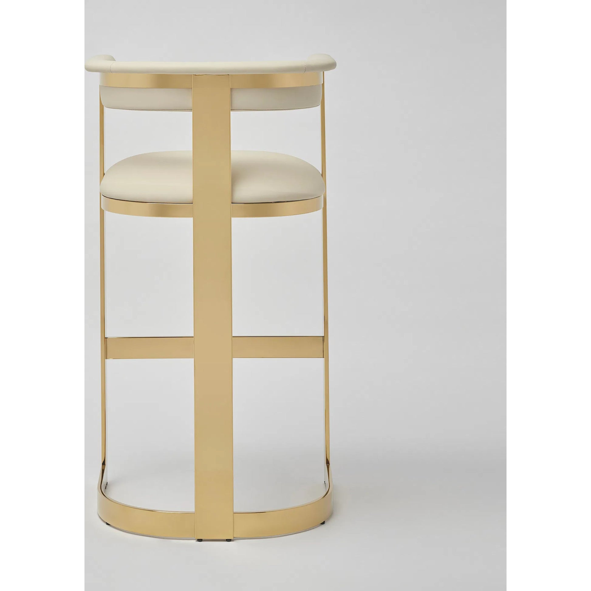 Darcy II Bar Stool by Interlude Home in buff cream and polished brass. Made from stainless steel, leather in a modern style.
