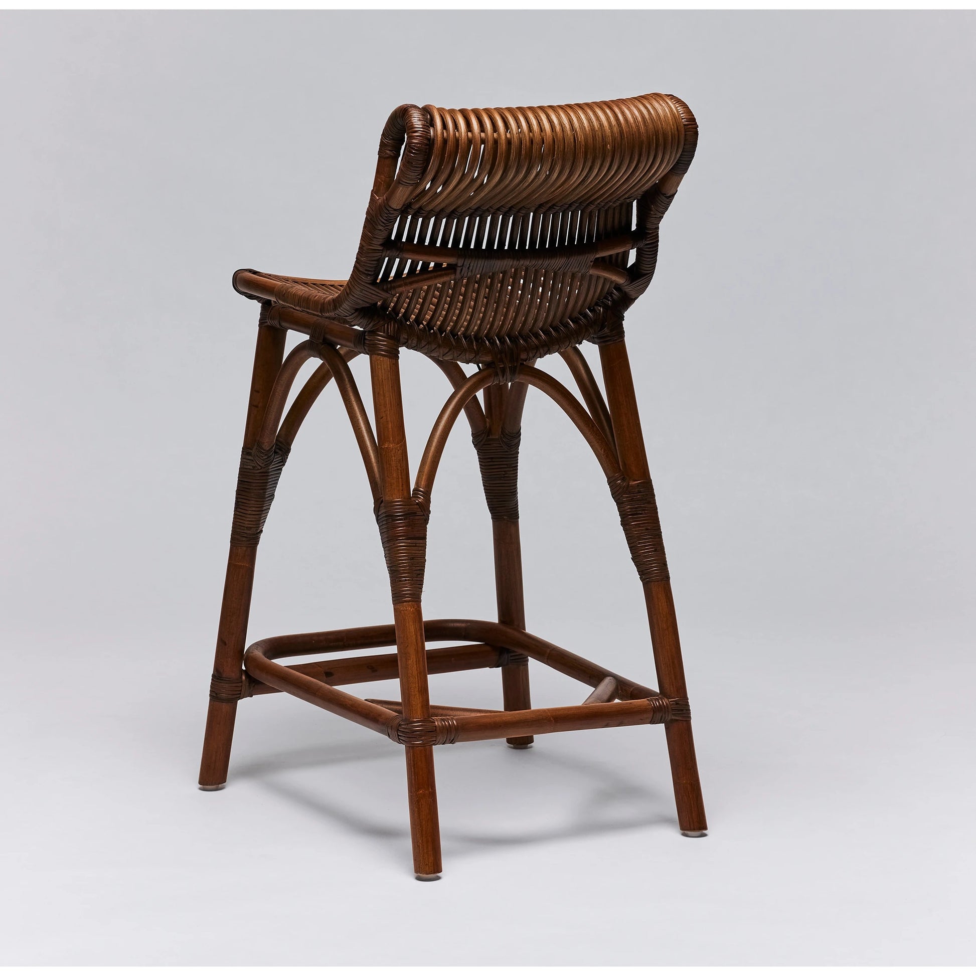 Naples Counter Stool by Interlude Home in warm taupe. Made from rattan in a cottage & farmhouse style.
