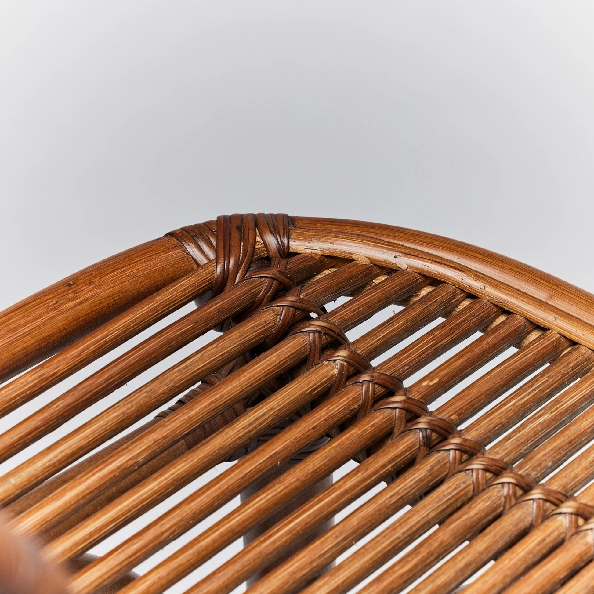Naples Counter Stool by Interlude Home in warm taupe. Made from rattan in a cottage & farmhouse style.