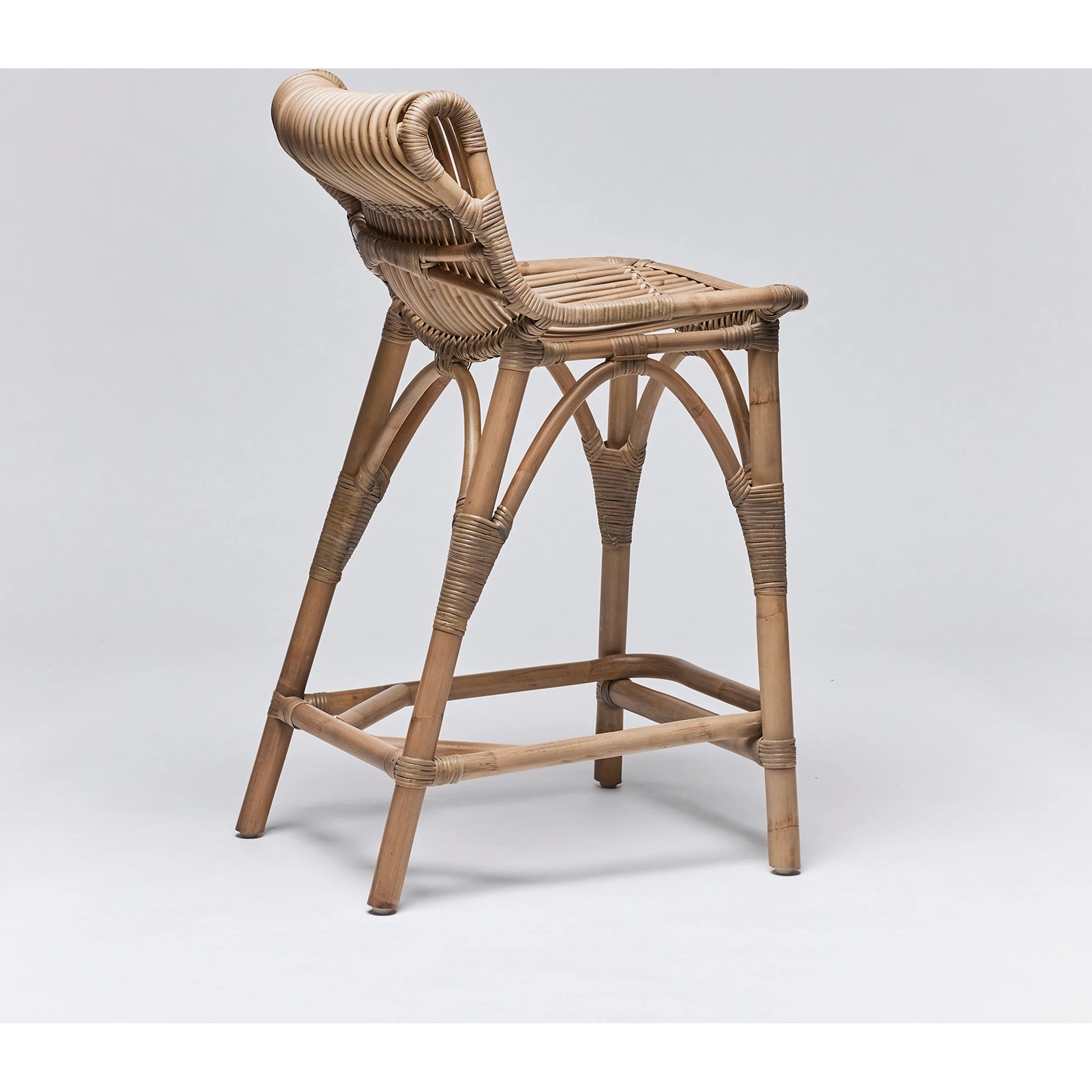 Naples Counter Stool by Interlude Home in warm taupe. Made from rattan in a cottage & farmhouse style.
