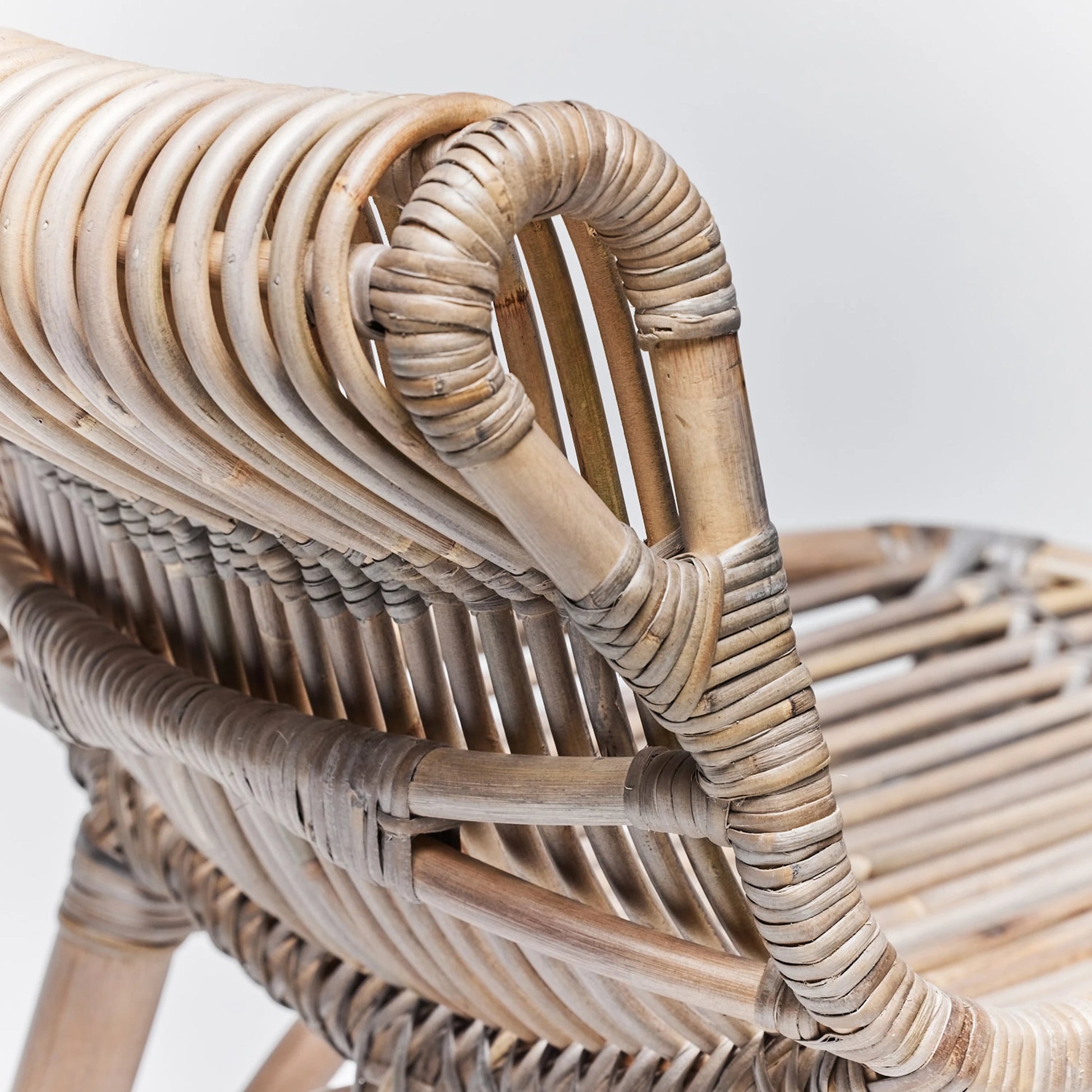 Naples Counter Stool by Interlude Home in warm taupe. Made from rattan in a cottage & farmhouse style.