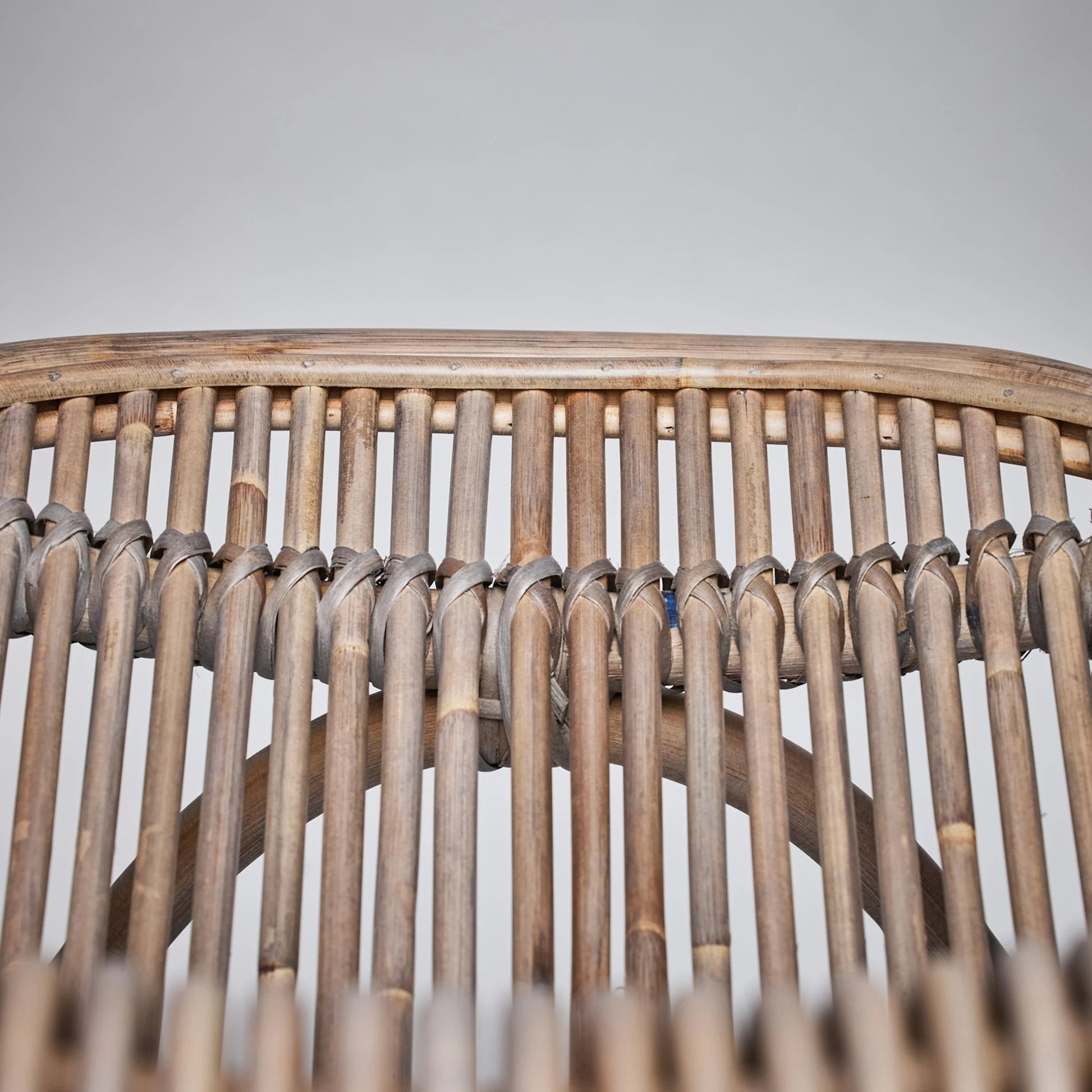 Naples Counter Stool by Interlude Home in warm taupe. Made from rattan in a cottage & farmhouse style.