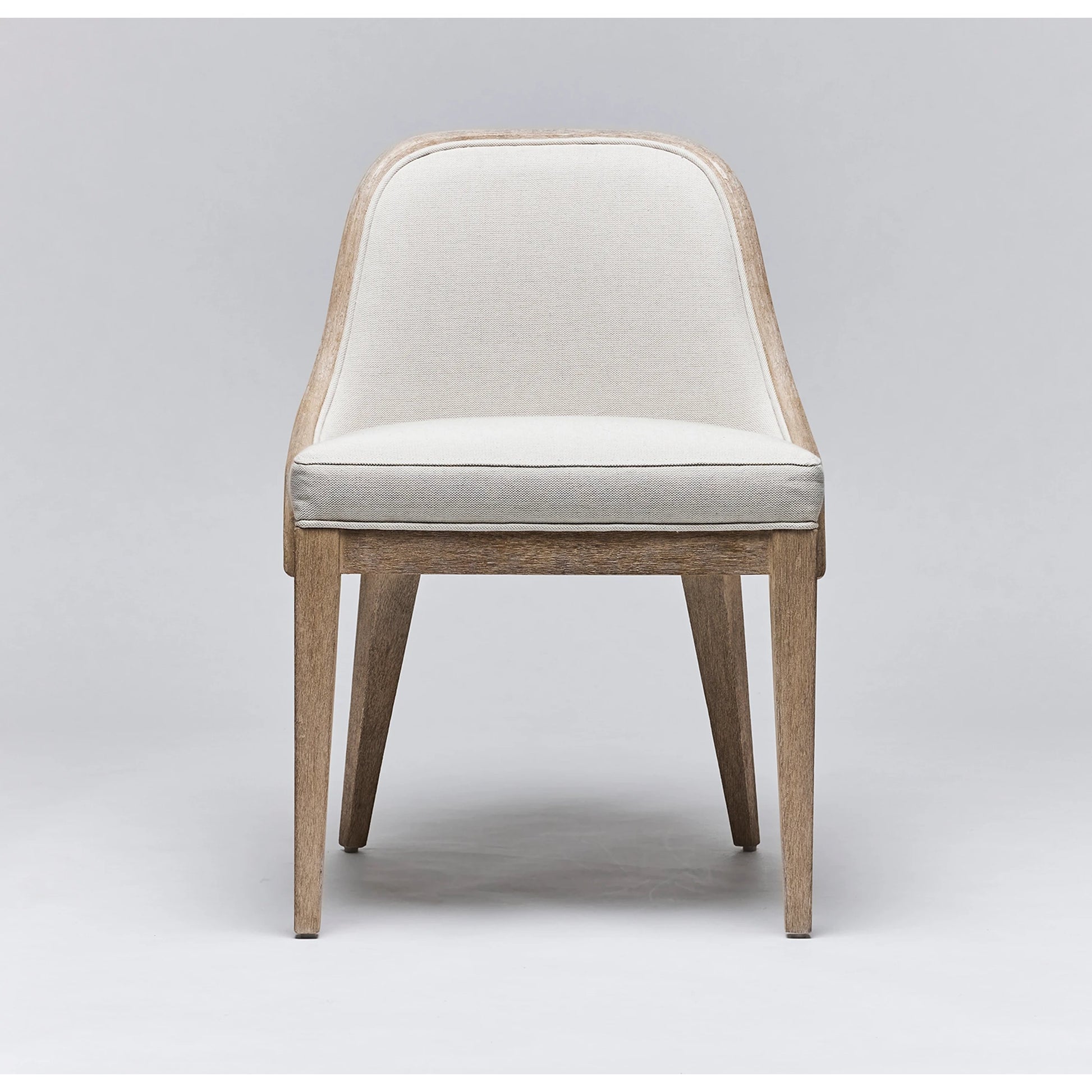 Siesta Dining Chair by Interlude Home. Made from mahogany, raffia, flax weave in a modern style.
