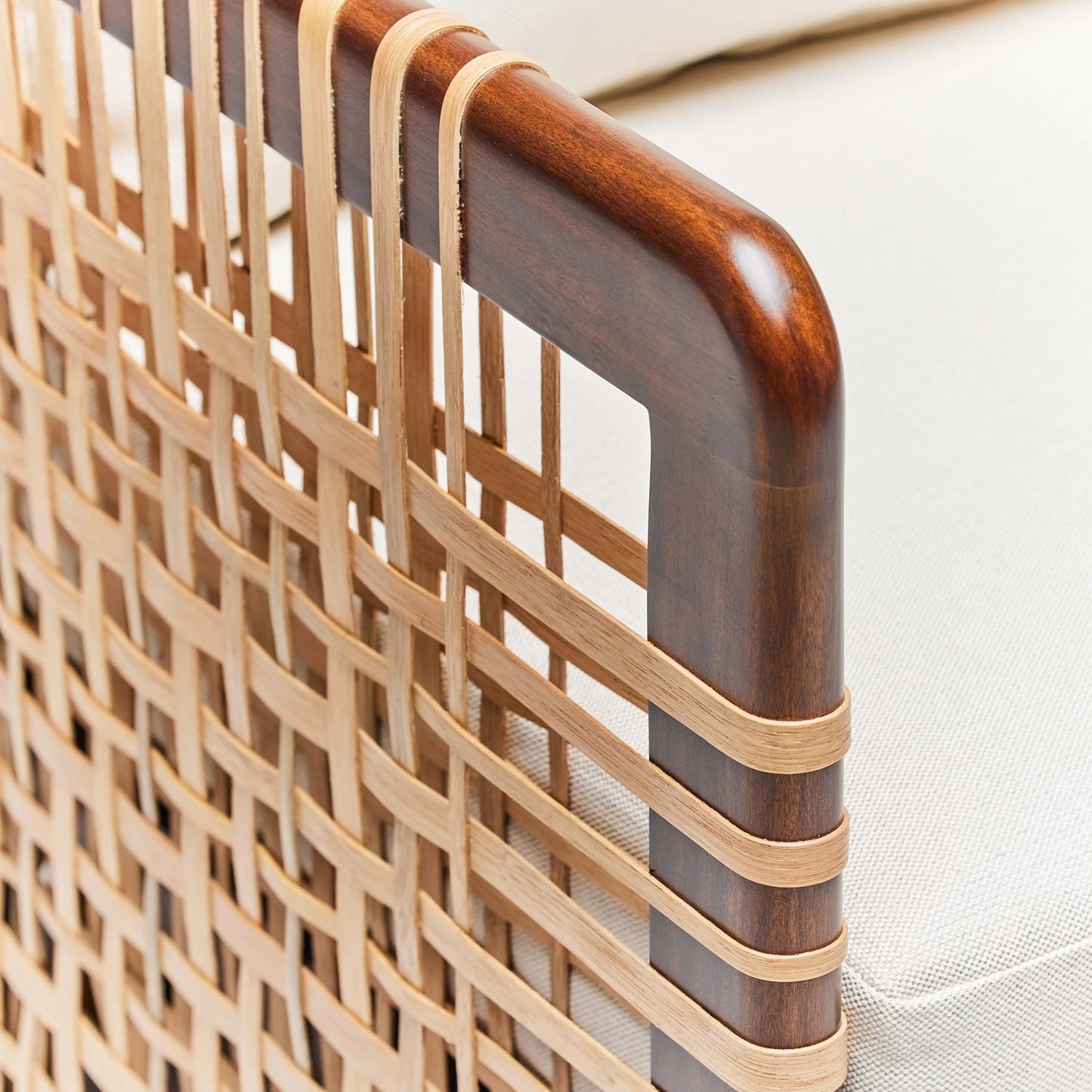 006 SI-2123075 | Closeup | Palms Lounge Chair by Interlude Home in chestnut, natural rattan, natural. Made from mahogany, rattan, flax weave in a cottage & farmhouse style.